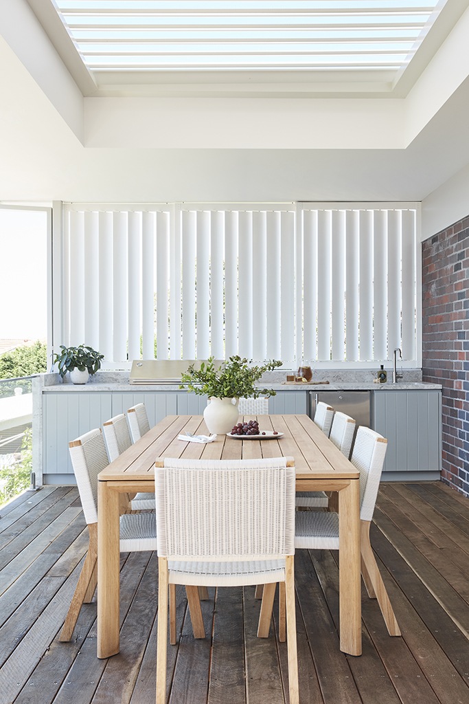 Shutters above and below frame this outdoor space. @anniebowendesign