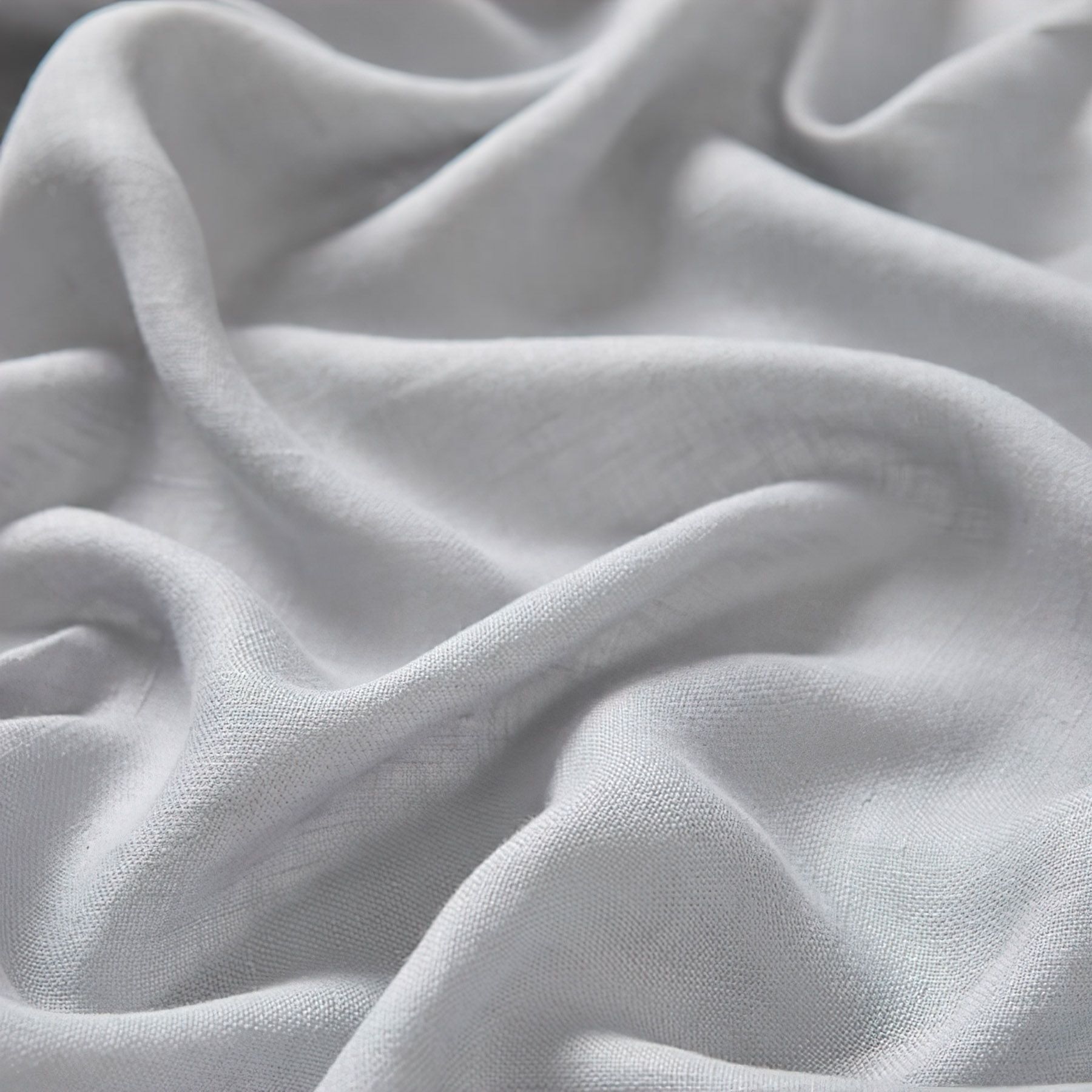 This beautiful 100% linen fabric from Warwick is light, luxurious, durable, and perfect for curtains.